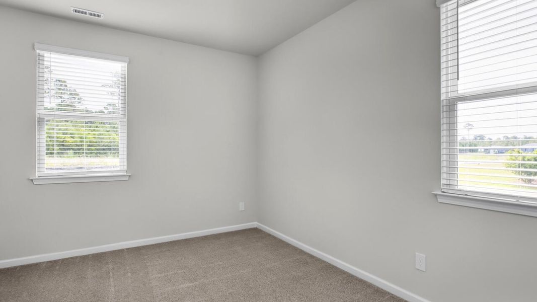 Spacious, unfurnished interior of a new home in Magnolia Ridge at Blake Farm, Wilmington (Image 26).