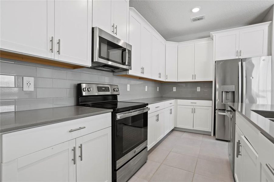 Furnished interior view inside a new home in , Davenport (Image 8).