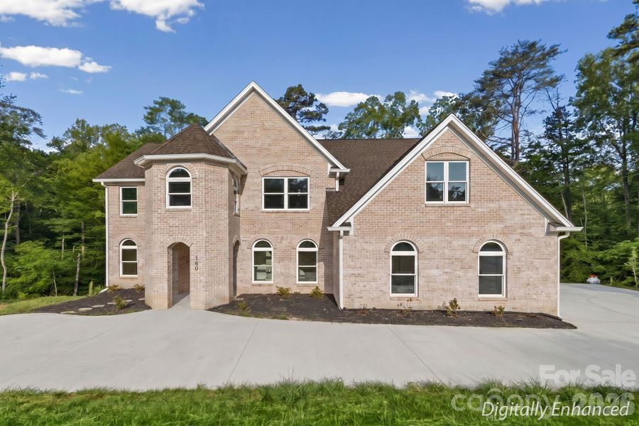 Front exterior of a new home in , Lewisville, NC, highlighting curb appeal (Image 2). Front exterior of a new home in , Lewisville, NC, highlighting curb appeal (Image 2).