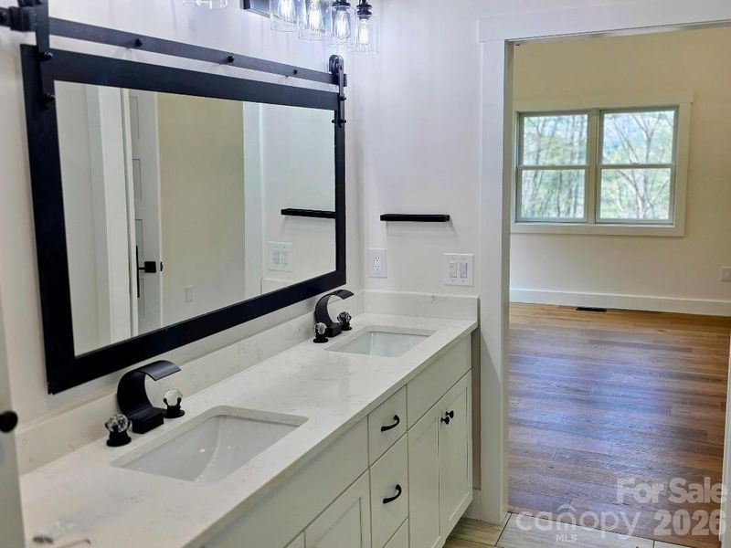 Ensuite bathroom with dual sinks