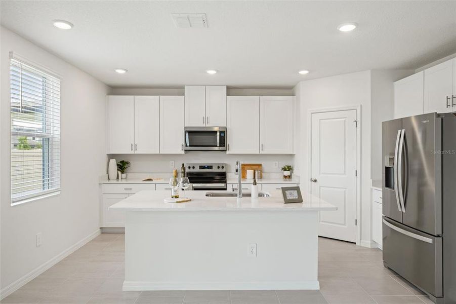 Furnished interior view inside a new home in Two Rivers - Classic Series, Zephyrhills (Image 14).