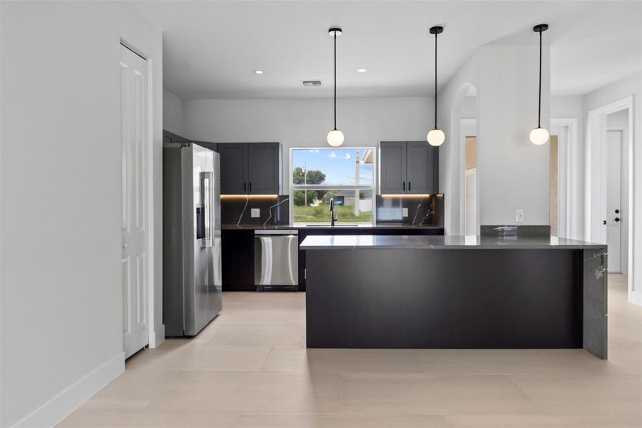 Furnished interior view inside a new home in , Port St. Lucie (Image 14).