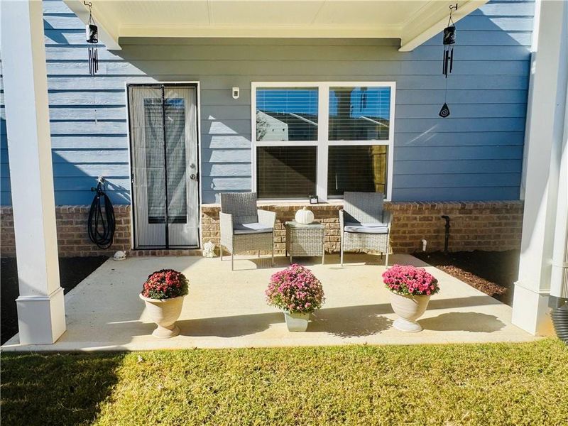 Exterior details and patio area of a home in Ellison Square, Sugar Hill (Image 24).