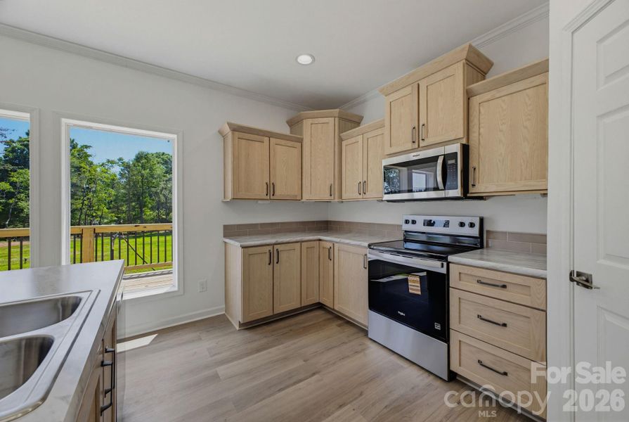 Furnished interior view inside a new home in , Newton (Image 14).