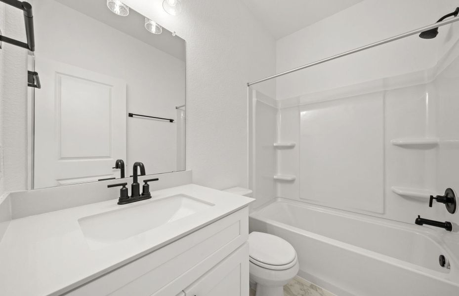 Furnished interior view inside a new home in Sunfield, Buda (Image 10).