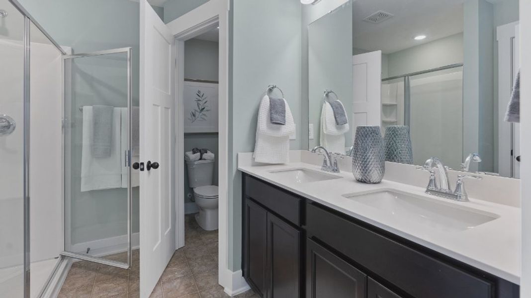 Furnished interior view inside a new home in Sidney Creek Townhomes, Zebulon (Image 14).