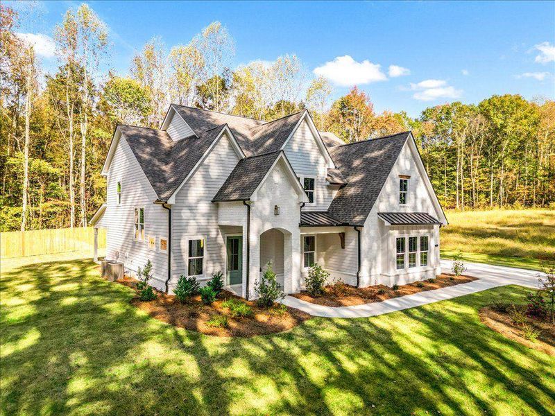 Front exterior of a new home in , Gainesville, GA, highlighting curb appeal (Image 21).