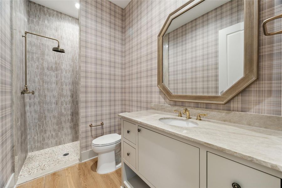 SECONDARY BATHROOM - Previous work by the builder, not representation of current build.