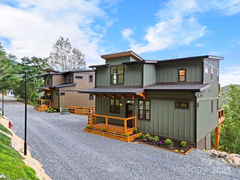 Front exterior of a new home in , Seven Devils, NC, highlighting curb appeal (Image 24). Front exterior of a new home in , Seven Devils, NC, highlighting curb appeal (Image 24).