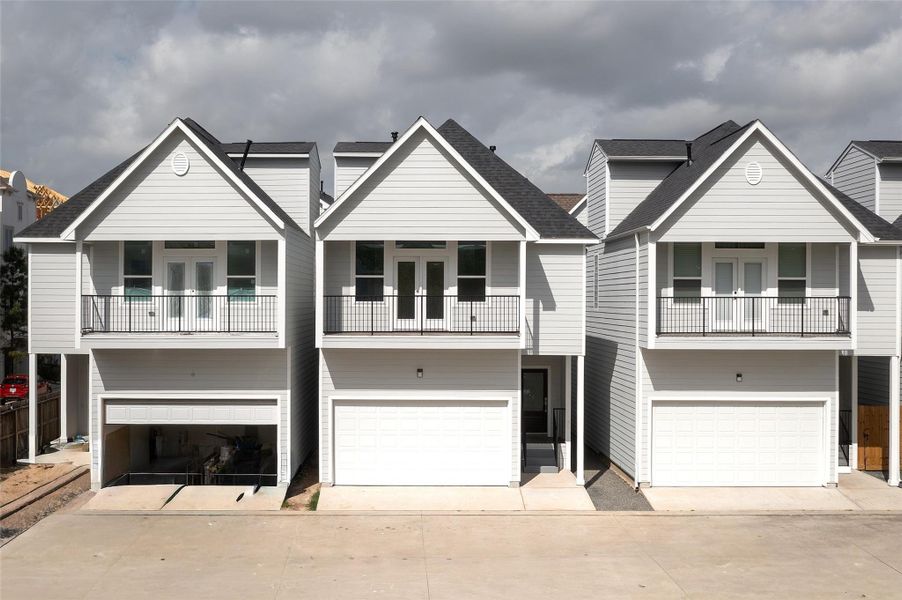 Front exterior of a new home in , Houston, TX, highlighting curb appeal (Image 28).