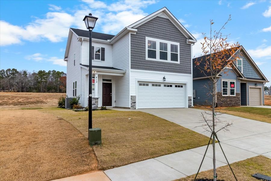 Front exterior of a new home in Windsor, North Augusta, SC, highlighting curb appeal (Image 20).