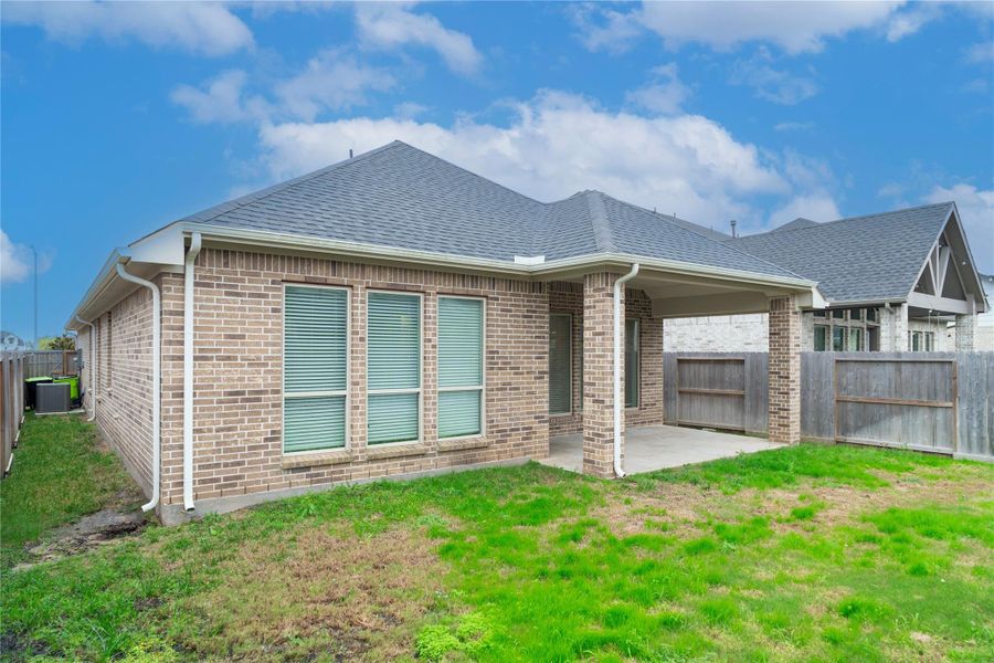 Exterior details and patio area of a home in Cross Creek West 45', Fulshear (Image 3). Exterior details and patio area of a home in Cross Creek West 45', Fulshear (Image 3).