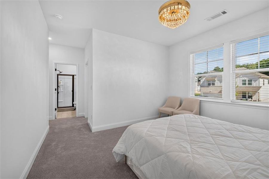 Furnished interior view inside a new home in Bailey Fence, Dacula (Image 32).