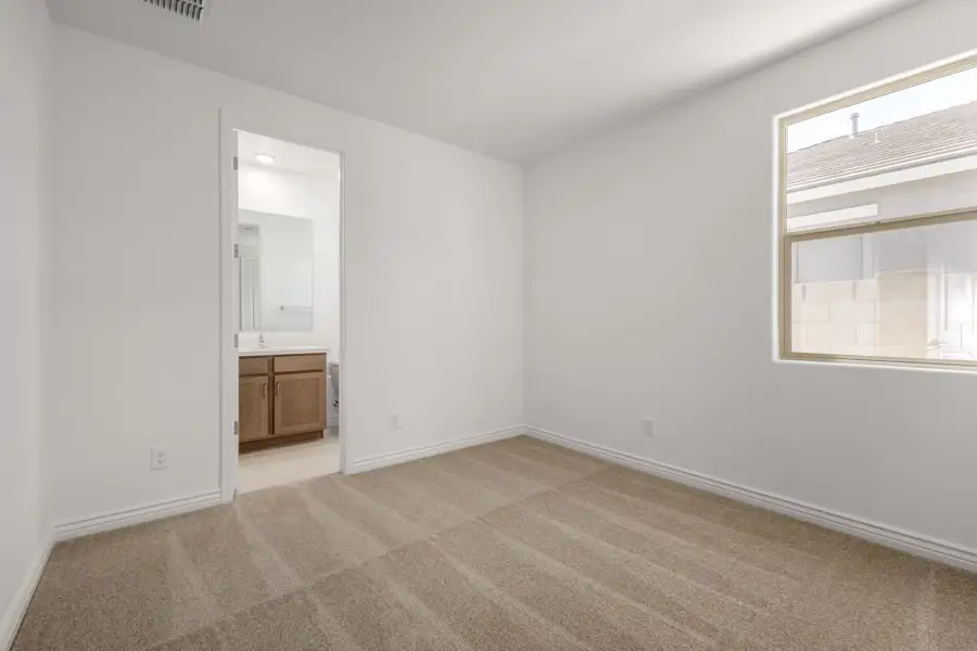 Spacious, unfurnished interior of a new home in Miravida, Surprise (Image 14).