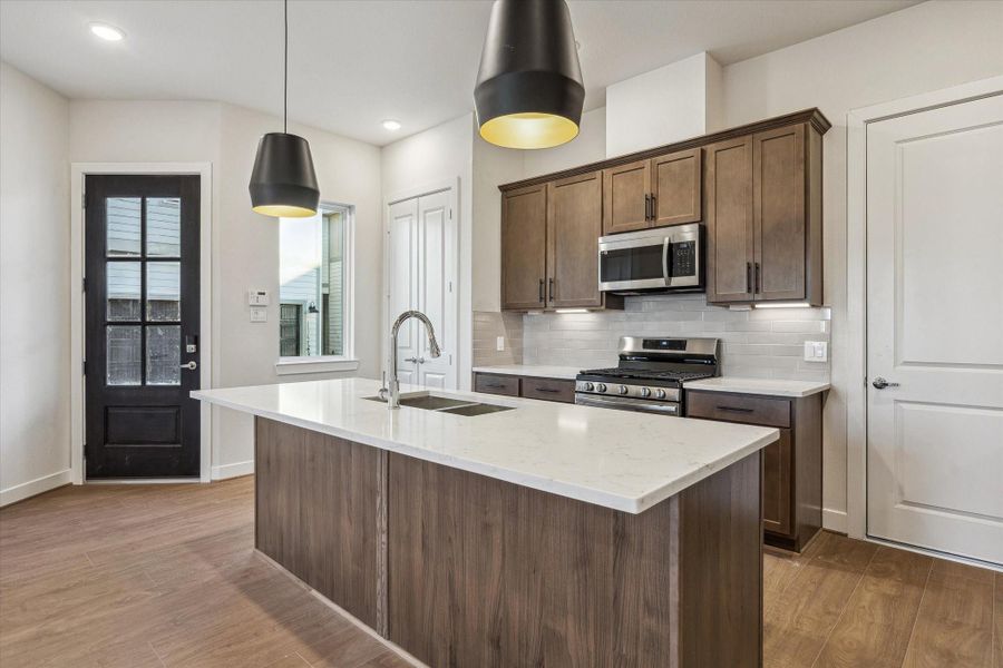 Kitchen – Previous work by the builder in the community, not representation of exact unit listed.