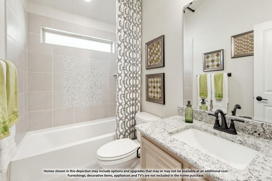 Bathroom with granite countertop vanity, tiled tub-shower combo, and small window above the tub Bathroom with granite countertop vanity, tiled tub-shower combo, and small window above the tub