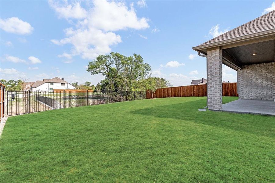 Exterior details and patio area of a home in Liberty, Melissa (Image 22).