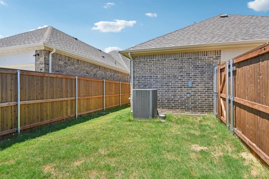 Front exterior of a new home in , Garland, TX, highlighting curb appeal (Image 18). Front exterior of a new home in , Garland, TX, highlighting curb appeal (Image 18).