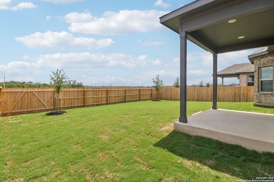 Front exterior of a new home in Arcadia Ridge - Classic Series, San Antonio, TX, highlighting curb appeal (Image 24).