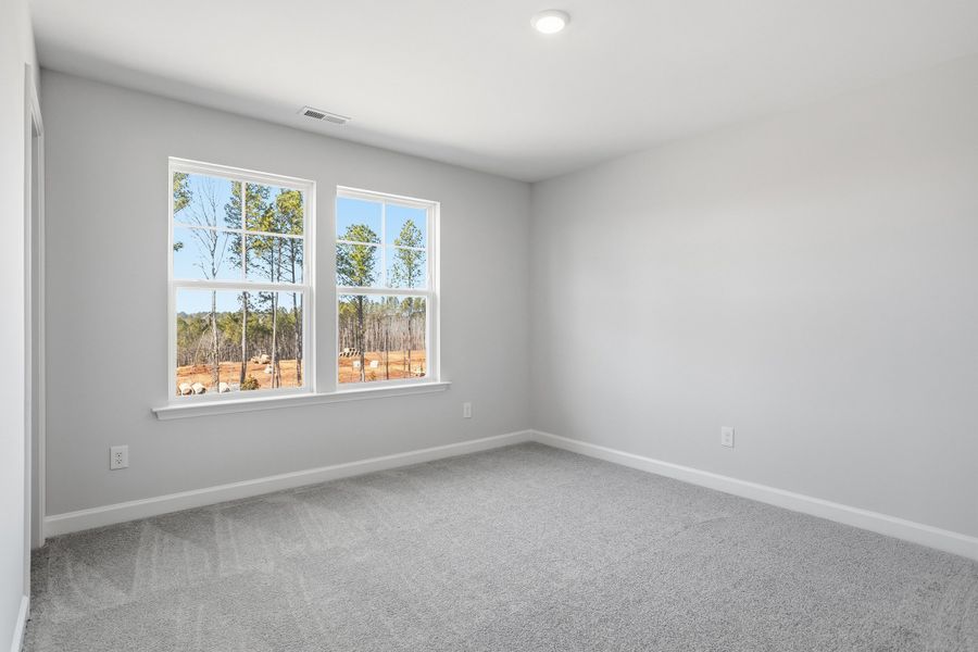 Spacious, unfurnished interior of a new home in Sweetbrier, Durham (Image 37).
