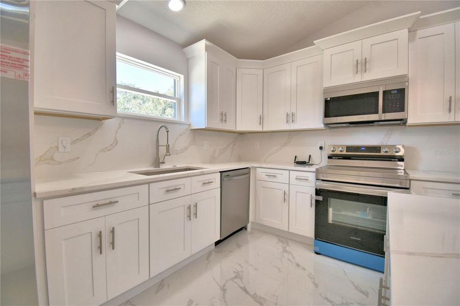 Furnished interior view inside a new home in , Poinciana (Image 18). Furnished interior view inside a new home in , Poinciana (Image 18).