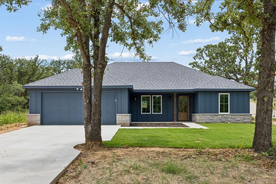 Front exterior of a new home in , Mineral Wells, TX, highlighting curb appeal (Image 2). Front exterior of a new home in , Mineral Wells, TX, highlighting curb appeal (Image 2).