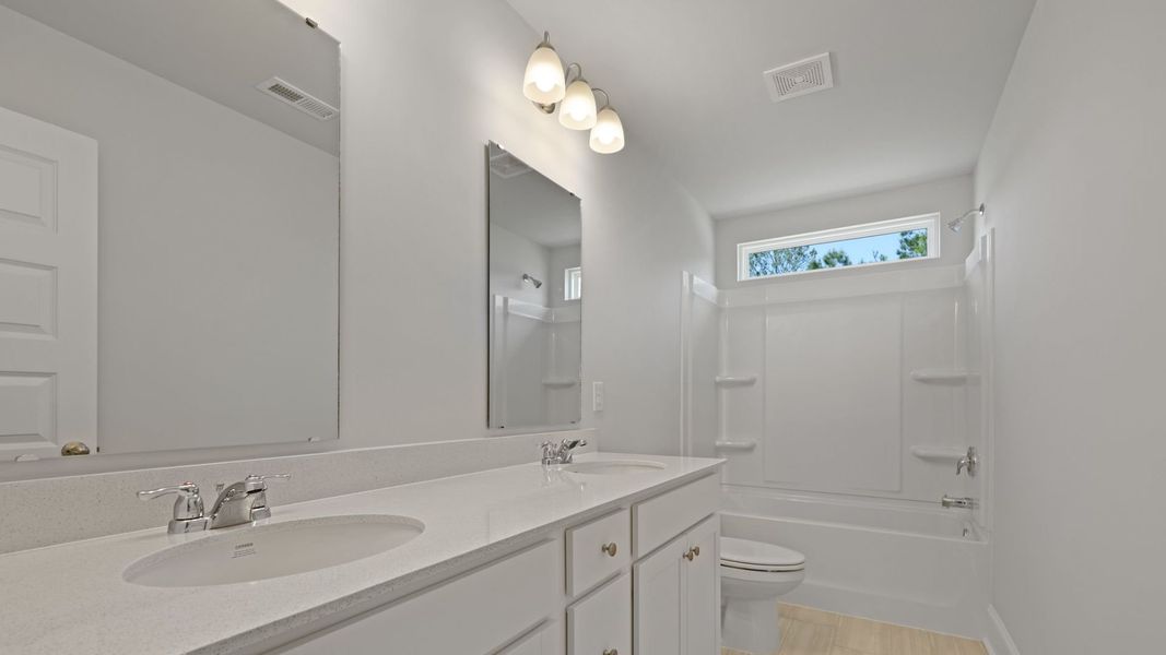 Representative furnished interior of a home built from the TILLMAN by D.R. Horton in Sheep Island, Summerville (Image 12). Representative furnished interior of a home built from the TILLMAN by D.R. Horton in Sheep Island, Summerville (Image 12).