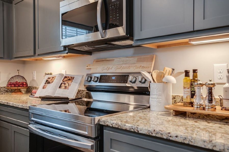 Kitchen.

*Photos are from a staged model home of floor plan. Options and Selections may vary in actual home.
