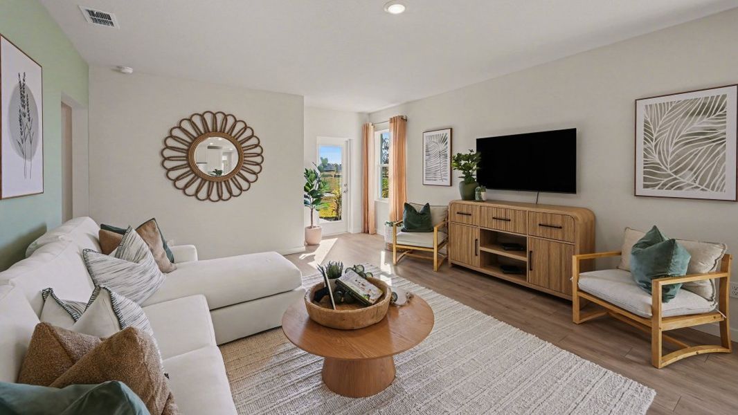 Representative furnished interior of a home built from the Harper by D.R. Horton in Bentley Crossing - Express & Tradition, Fort Myers (Image 4).