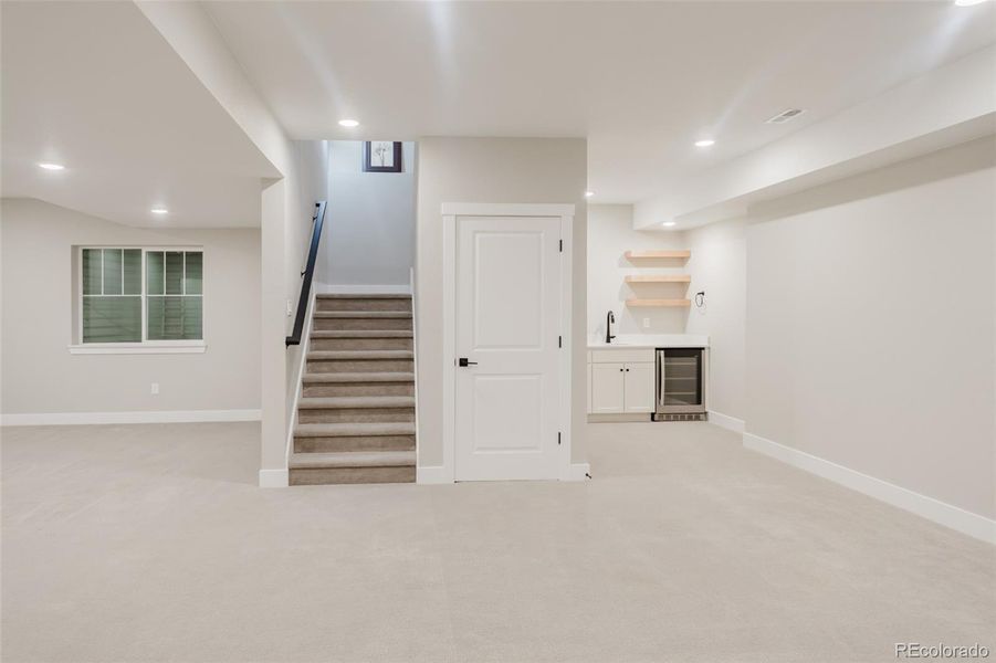 View of the family room toward the bar area View of the family room toward the bar area
