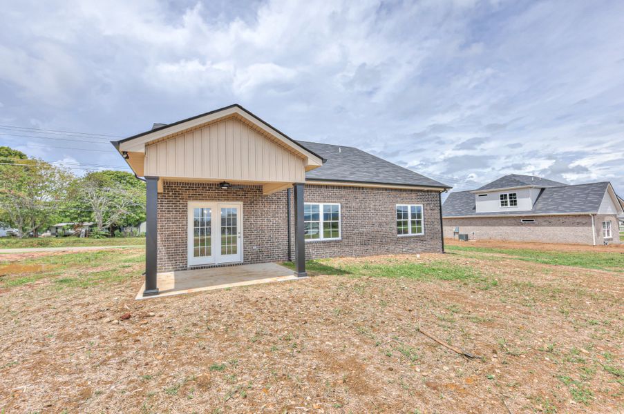 Front exterior of a new home in Legacy Preserve, Decherd, TN, highlighting curb appeal (Image 14).