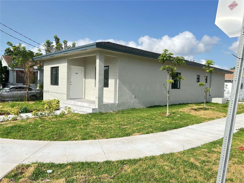 Exterior details and patio area of a home in , Miami (Image 2). Exterior details and patio area of a home in , Miami (Image 2).