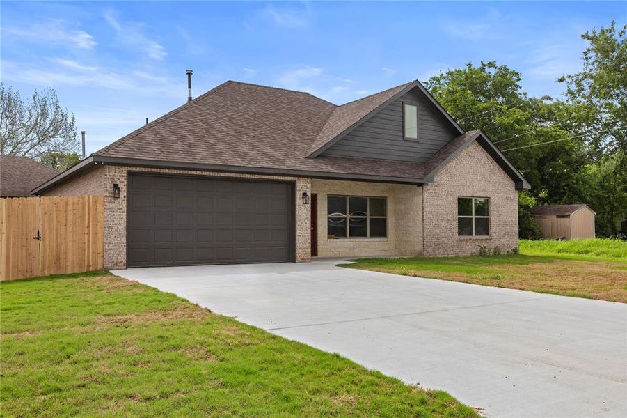 Front exterior of a new home in , Tom Bean, TX, highlighting curb appeal (Image 18).