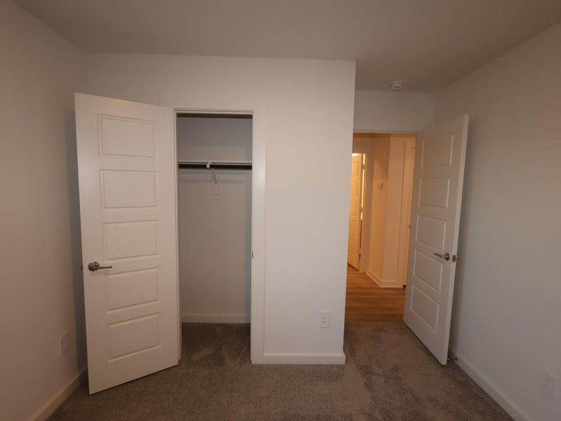 Spacious, unfurnished interior of a new home in Pinewood at Grand Texas, New Caney (Image 22).