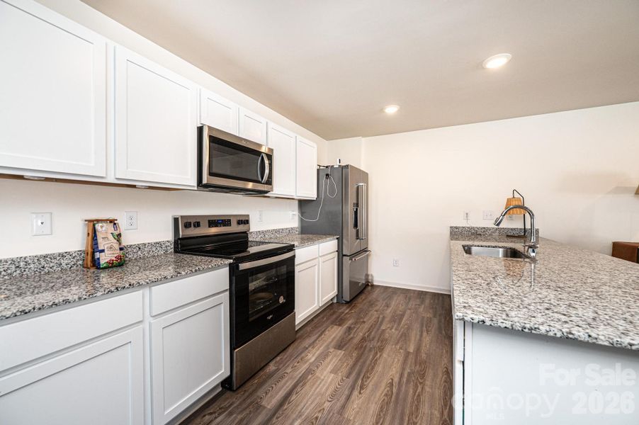 Furnished interior view inside a new home in , Newton (Image 6).