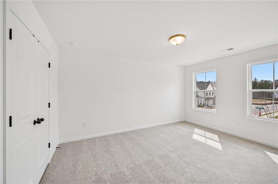 Spacious, unfurnished interior of a new home in Arbors at Richland Creek, Buford (Image 22).