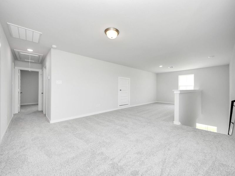 Spacious, unfurnished interior of a new home in Sunterra, Katy (Image 23).