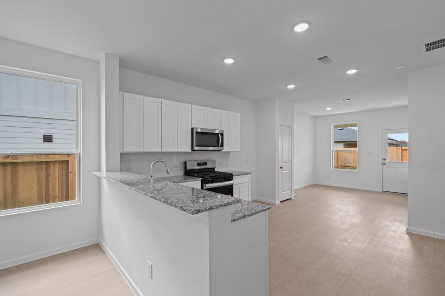 Furnished interior view inside a new home in Montgomery Bend, Montgomery (Image 8).