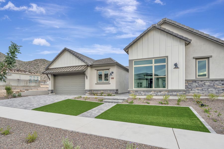 Front exterior of a new home in The Ridge at Victory, Litchfield Park, AZ, highlighting curb appeal (Image 2). Front exterior of a new home in The Ridge at Victory, Litchfield Park, AZ, highlighting curb appeal (Image 2).