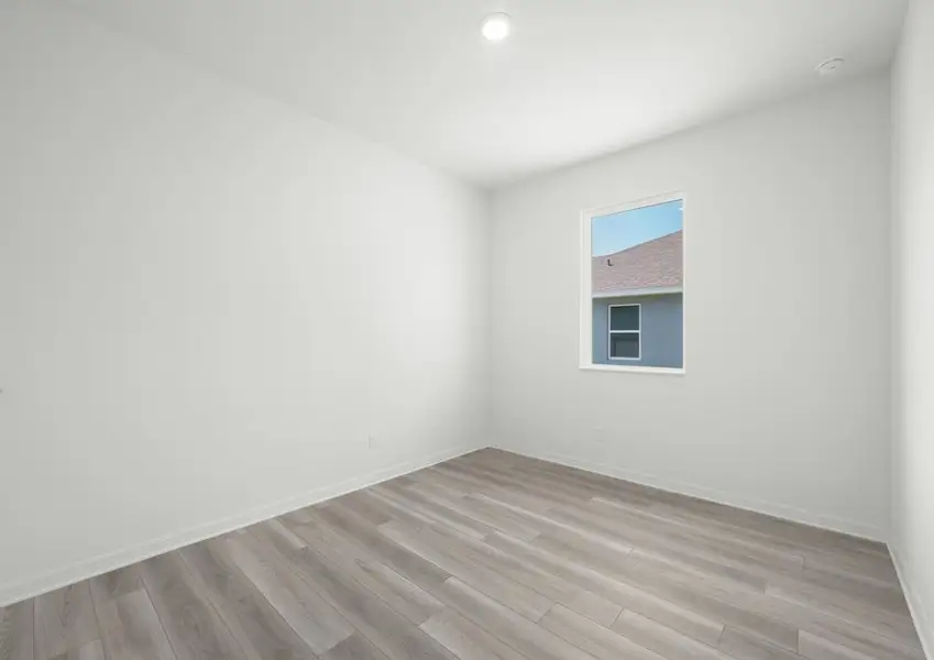 Flex room in the Braden - FL home in Fort Pierce, featuring vinyl flooring and a window.