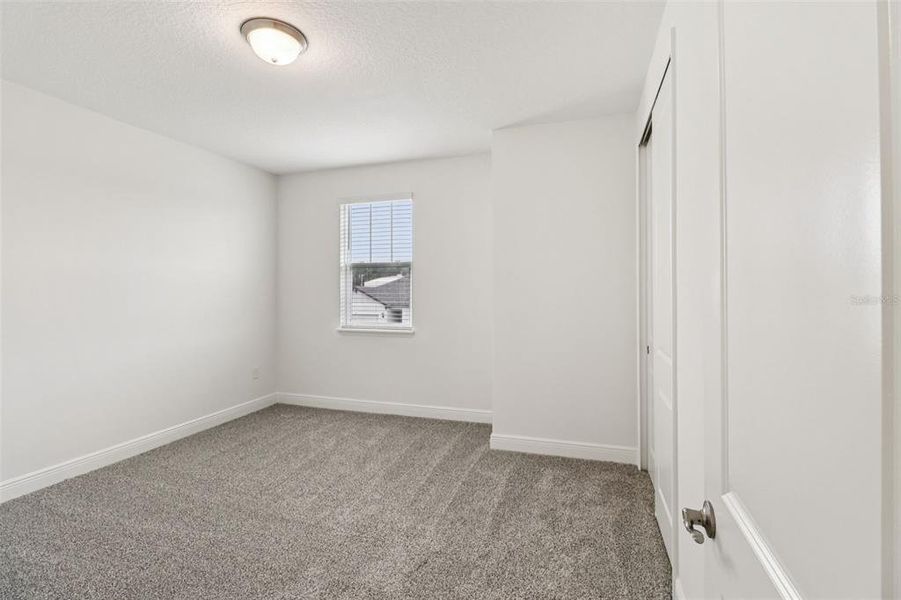 Spacious, unfurnished interior of a new home in Legends Preserve - Signature Series, Daytona Beach (Image 33).