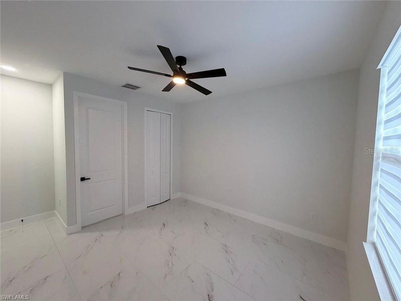 Spacious, unfurnished interior of a new home in , Lehigh Acres (Image 27).