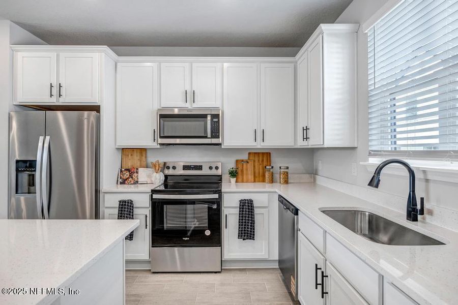Furnished interior view inside a new home in , Jacksonville (Image 15).