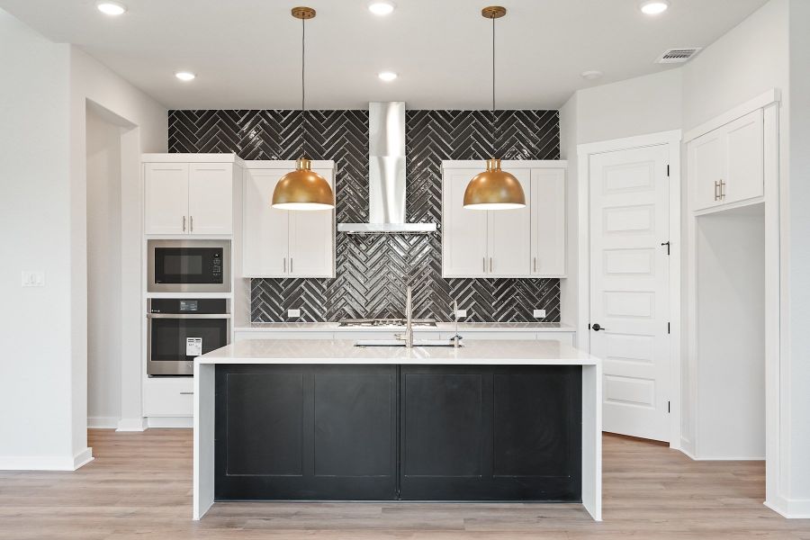 Furnished interior view inside a new home in Wolf Ranch, Georgetown (Image 13).