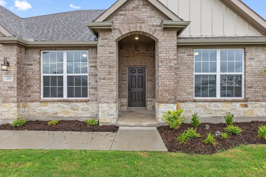 Front exterior of a new home in Waverly Estates, Nevada, TX, highlighting curb appeal (Image 45).
