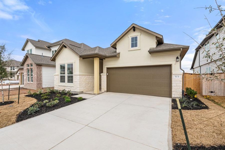 Front exterior of a new home in Park Central, Georgetown, TX, highlighting curb appeal (Image 21).