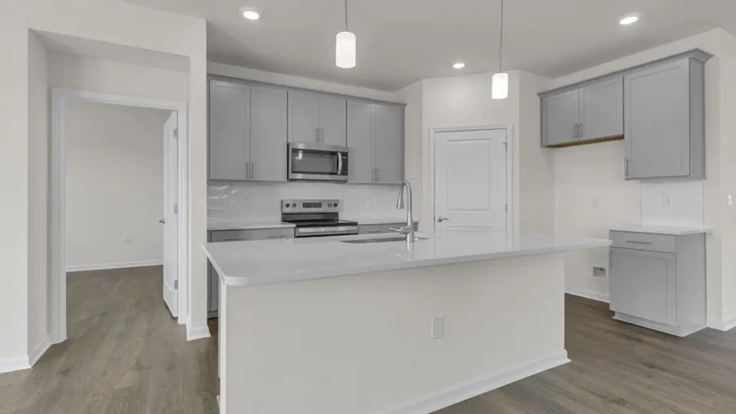 Furnished interior view inside a new home in The Villas at Kinsley, Jamestown (Image 4). Furnished interior view inside a new home in The Villas at Kinsley, Jamestown (Image 4).