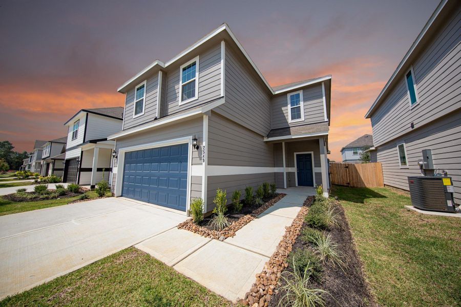 Front exterior of a new home in Cliffstone Hills, Conroe, TX, highlighting curb appeal (Image 17). Front exterior of a new home in Cliffstone Hills, Conroe, TX, highlighting curb appeal (Image 17).