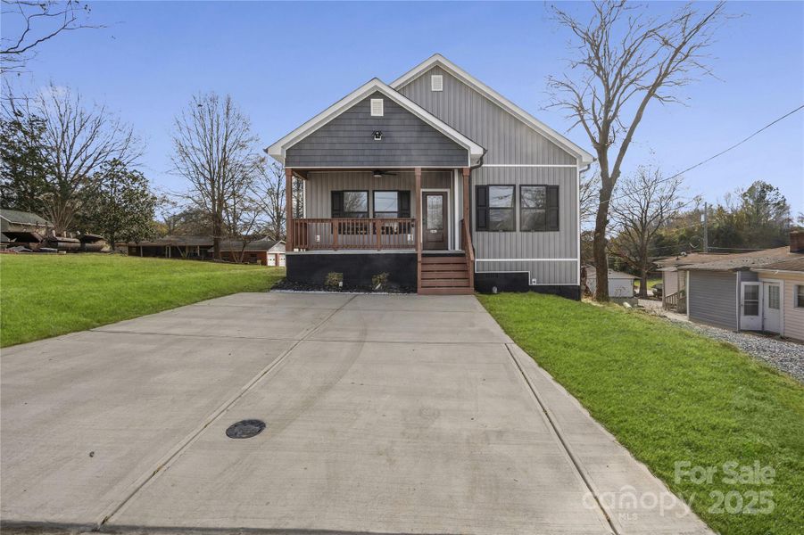 Front exterior of a new home in , Concord, NC, highlighting curb appeal (Image 2). Front exterior of a new home in , Concord, NC, highlighting curb appeal (Image 2).