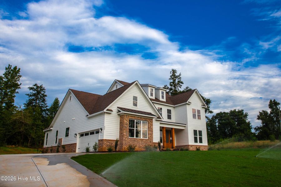 Front exterior of a new home in Marshall Mills, Grovetown, GA, highlighting curb appeal (Image 9).